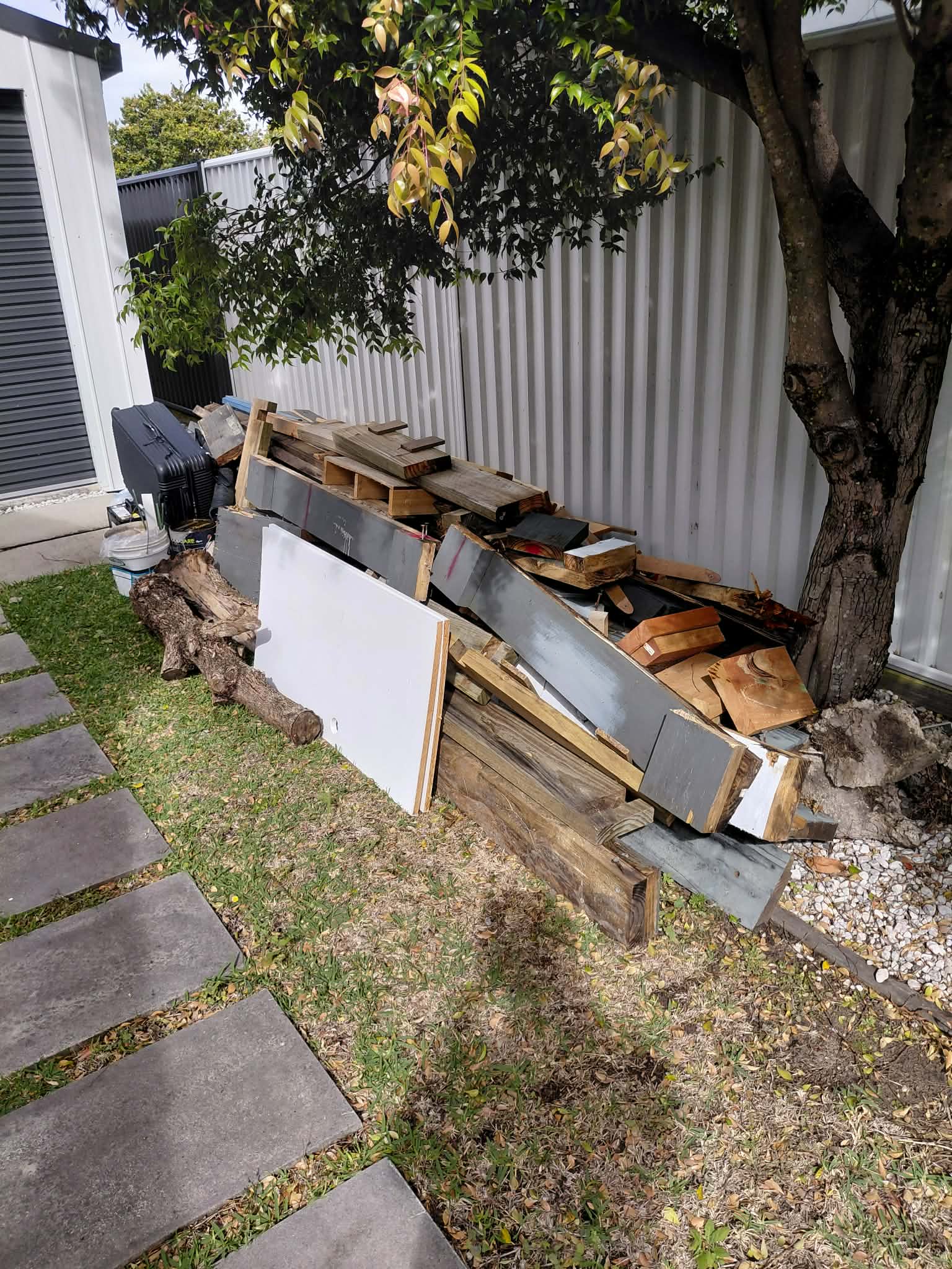 Pile of timber and building waste ready for rubbish removal